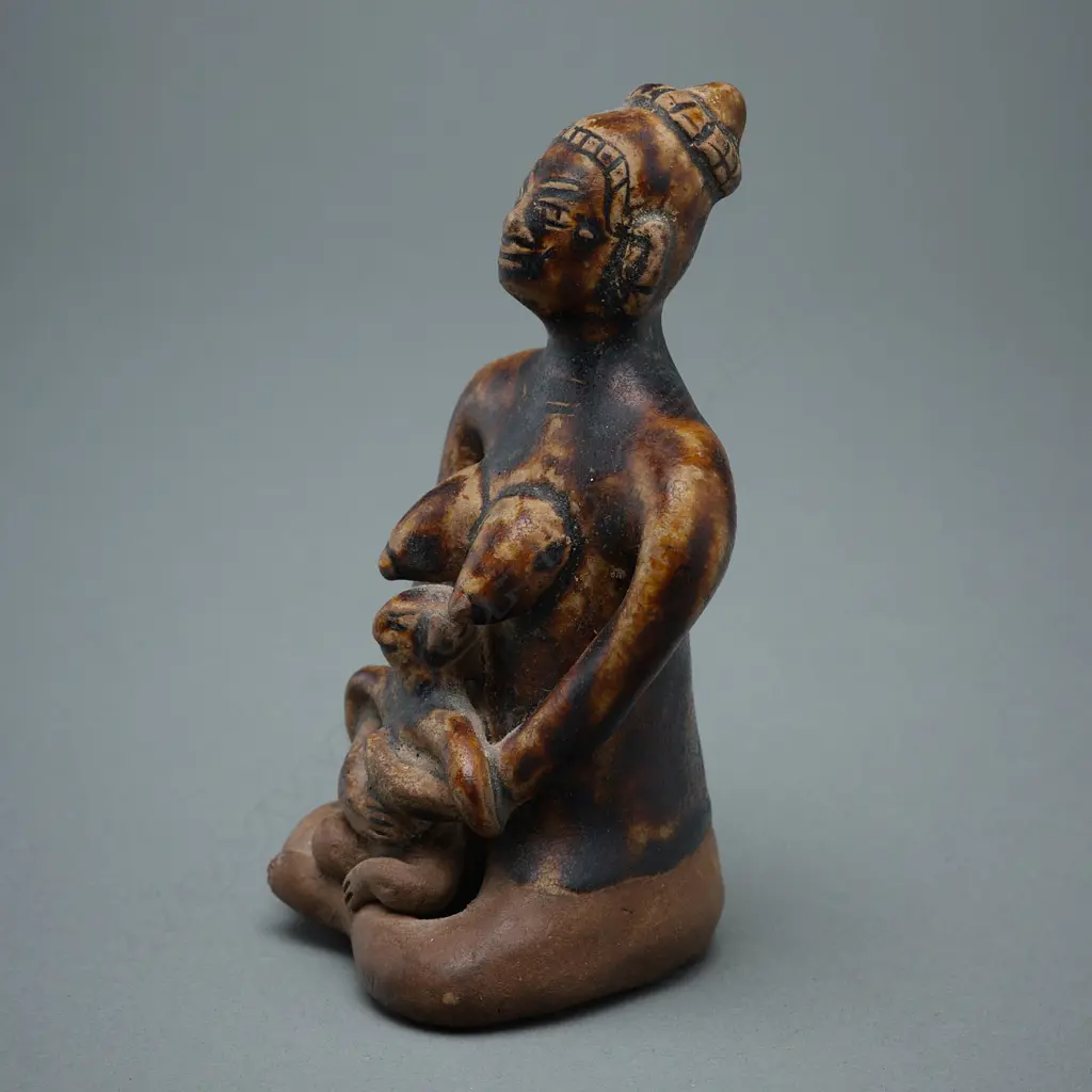 A Sawankhalok stoneware figure (tukatha), Image 1++